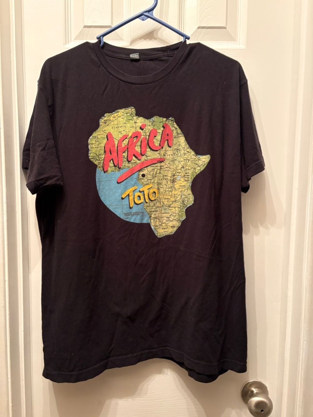Toto "Africa" Black Graphic Tee - Band Logo Shirt